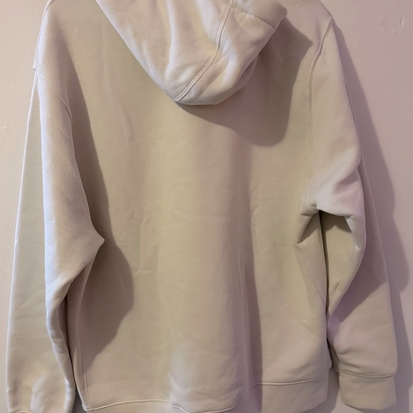 Brand New Large Nike Hoodie. (NWT)! Cream colored, with a black Nike swoosh. - Picture 5 of 8